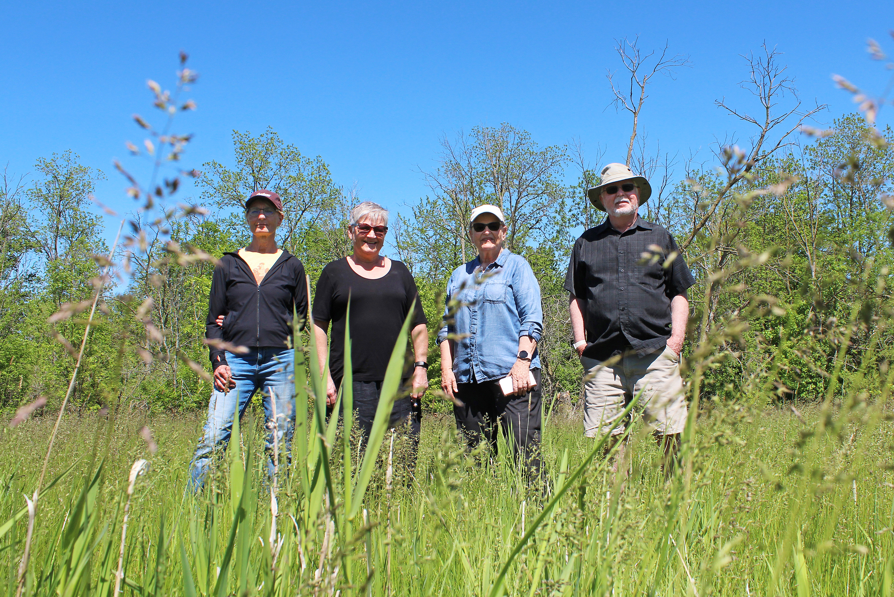 Green Team volunteers at tree planting site