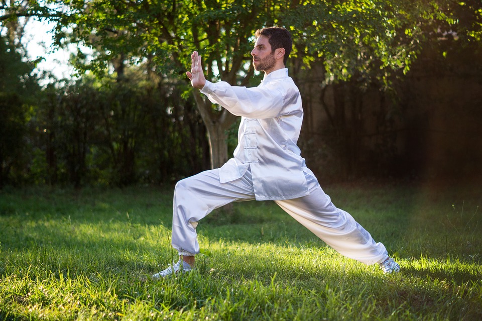 a man practicing the gentle fitness activity of tai chi 