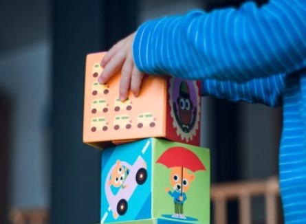 Child building and playing with blocks