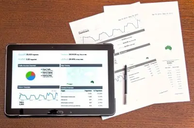 laptop with graph on screen
